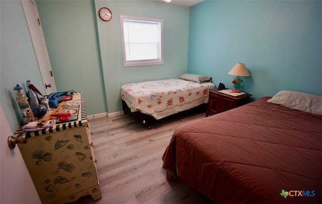 bedroom featuring light hardwood / wood-style flooring