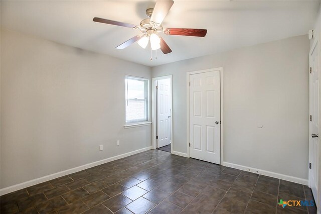 1504 Phyllis Dr, Copperas Cove, TX 76522 - unfurnished bedroom with baseboards and ceiling fan