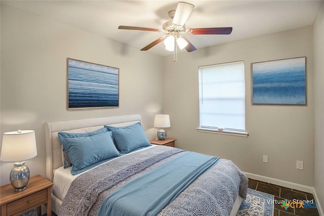 1504 Phyllis Dr, Copperas Cove, TX 76522 - bedroom with tile patterned floors and a ceiling fan