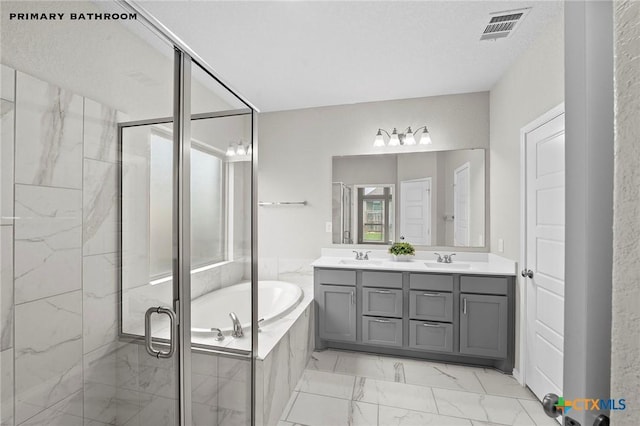 646 Arroyo Loma, New Braunfels, TX 78130 - full bath with marble look tiles, a bath, a stall shower, and double vanity