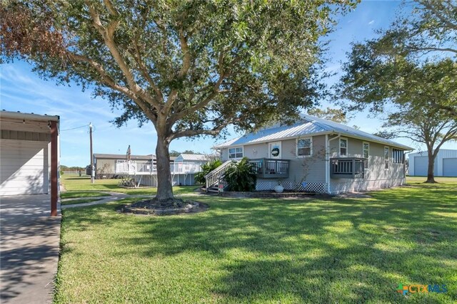 612 W Jackson Ave, Port Oconnor, TX 77982 - view of green lawn