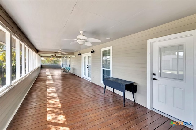 612 W Jackson Ave, Port Oconnor, TX 77982 - wooden deck featuring french doors and ceiling fan