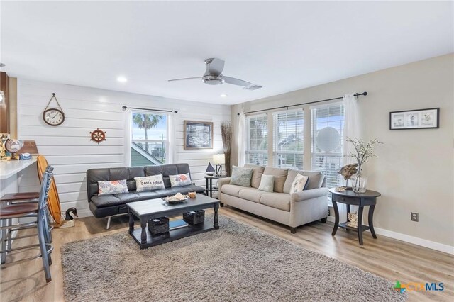 30 Nassau Dr, Rockport, TX 78382 - living room featuring baseboards, wood finished floors, recessed lighting, and a ceiling fan