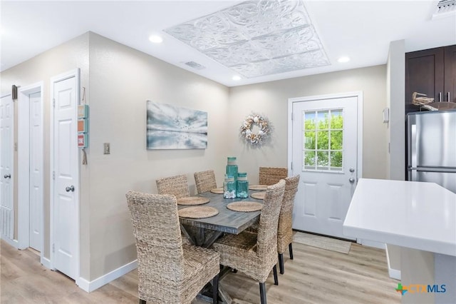 30 Nassau Dr, Rockport, TX 78382 - dining space with visible vents, baseboards, light wood-style floors, and recessed lighting