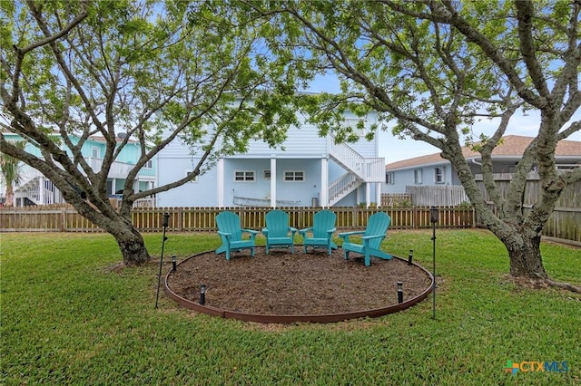 30 Nassau Dr, Rockport, TX 78382 - view of playground featuring a lawn and fence