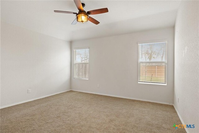 837 Margay Loop, Seguin, TX 78155 - carpeted empty room with ceiling fan and baseboards