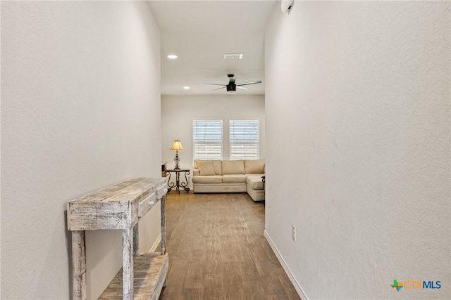 837 Margay Loop, Seguin, TX 78155 - hall featuring wood finished floors, recessed lighting, and baseboards