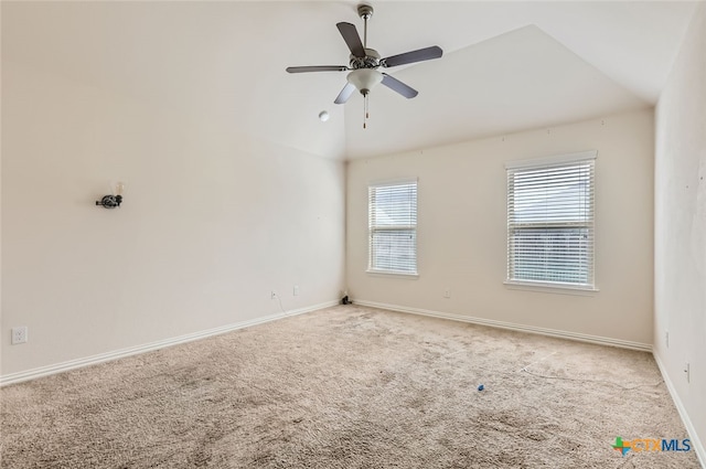 unfurnished room featuring ceiling fan, light carpet, and lofted ceiling