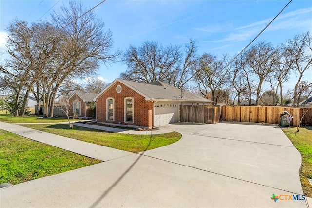 view of home's exterior featuring a garage and a lawn