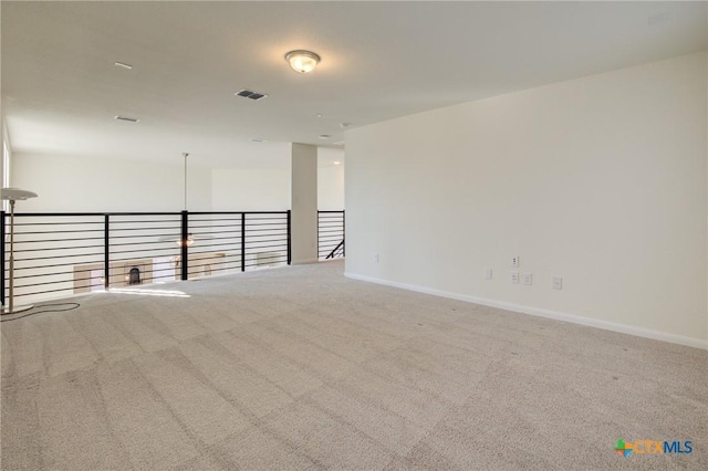 empty room featuring carpet flooring