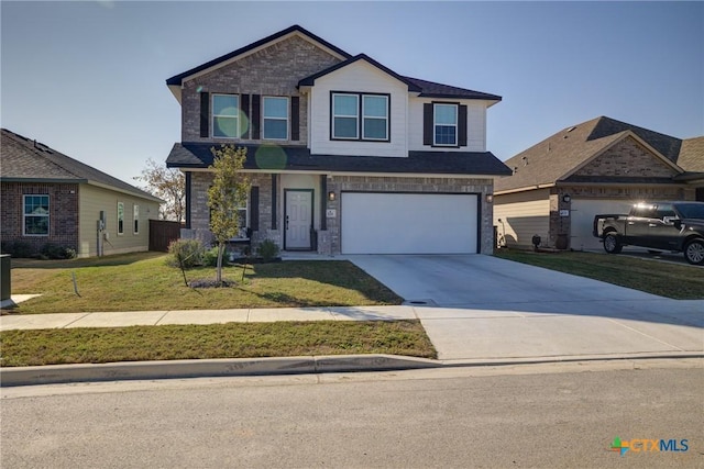 view of front of property with a front yard and a garage