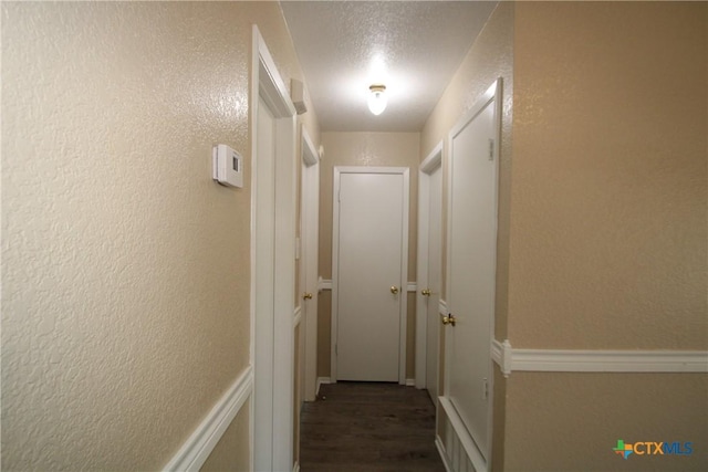2604 Cross Timber Dr, Killeen, TX 76543 - hall featuring wood finished floors and a textured wall