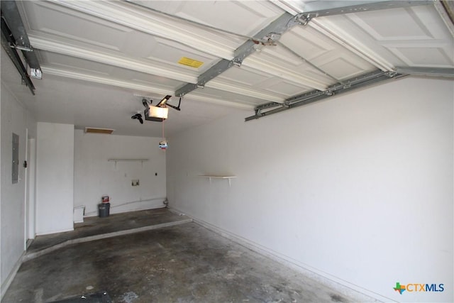 2604 Cross Timber Dr, Killeen, TX 76543 - garage featuring electric panel and a garage door opener