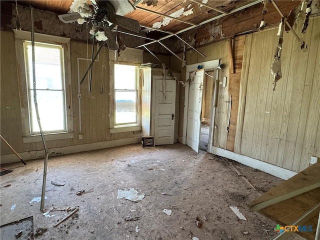 interior space featuring ceiling fan