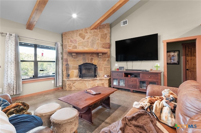 living room with vaulted ceiling with beams and a fireplace