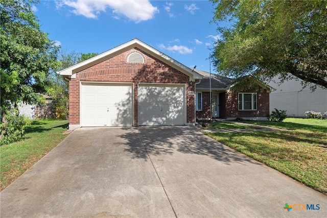 ranch-style house with brick siding, a front lawn, an attached garage, and driveway