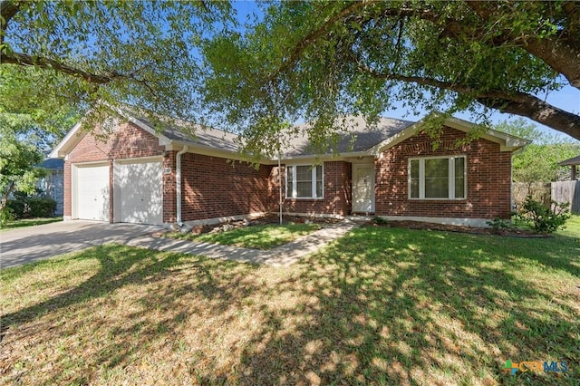 single story home featuring fence, brick siding, a garage, a front yard, and concrete driveway