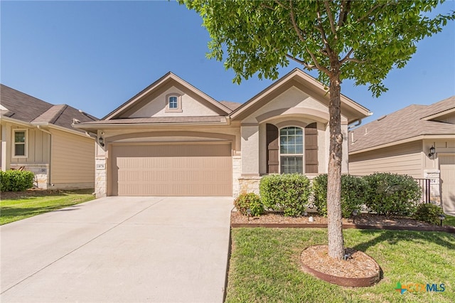 ranch-style home featuring a garage and a front lawn