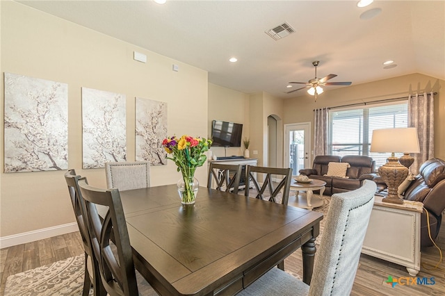 dining space featuring ceiling fan and hardwood / wood-style floors