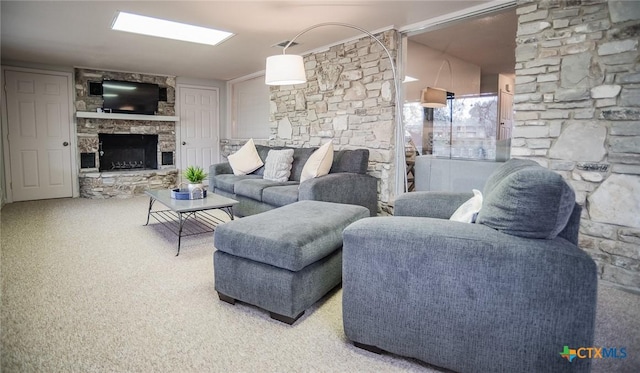 living room featuring a stone fireplace