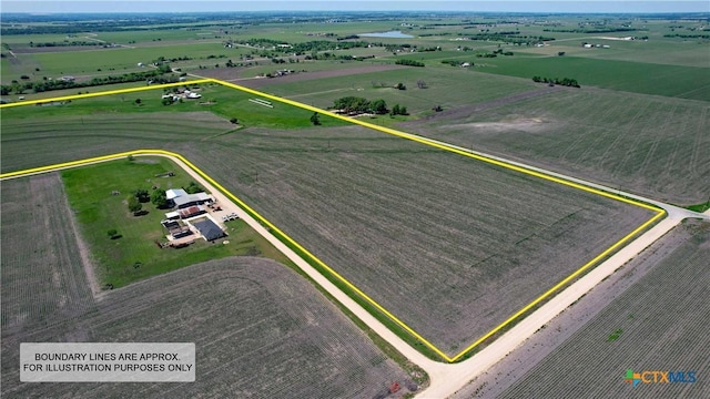 birds eye view of property featuring a rural view