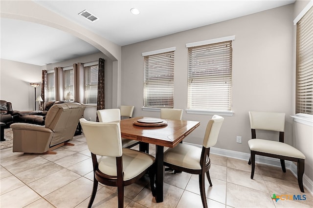 dining room featuring light tile patterned floors