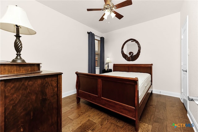 bedroom featuring dark wood-type flooring and ceiling fan