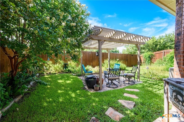 view of yard featuring a pergola and a patio area