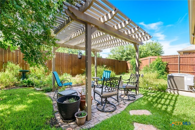 view of patio / terrace with central air condition unit and a pergola