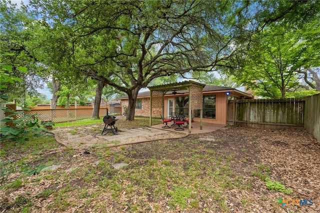3909 Alderwood Ln, Temple, TX 76502 - fenced backyard with a patio