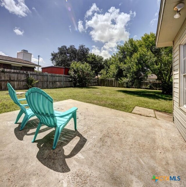 3207 Linda Dr, Victoria, TX 77901 - fenced backyard featuring a patio