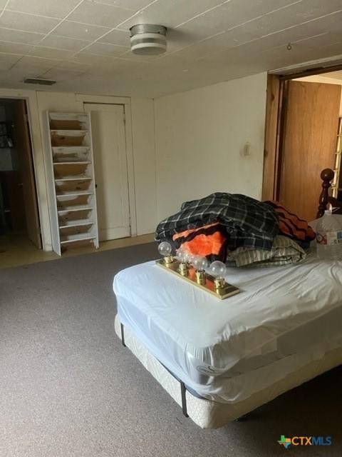 bedroom featuring visible vents and carpet floors