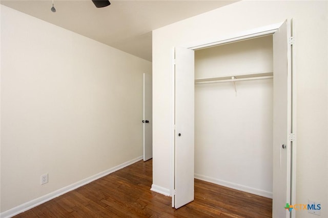 1004 Estes Dr, Killeen, TX 76541 - unfurnished bedroom with baseboards, wood finished floors, and a closet