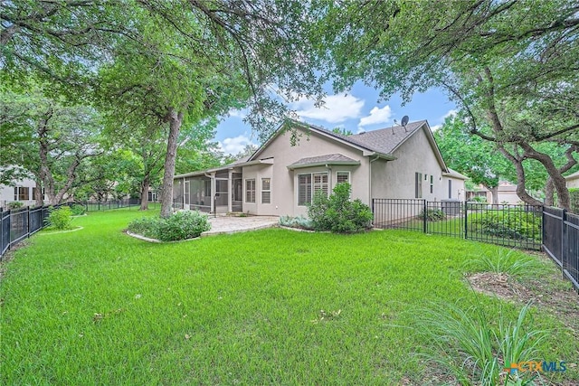 109 Ranch House Cv, Georgetown, TX 78633 - rear view of property with a sunroom and stucco siding