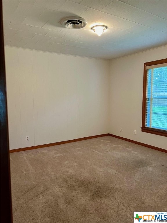 view of carpeted spare room