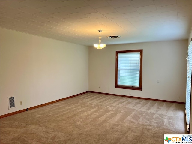 view of carpeted spare room