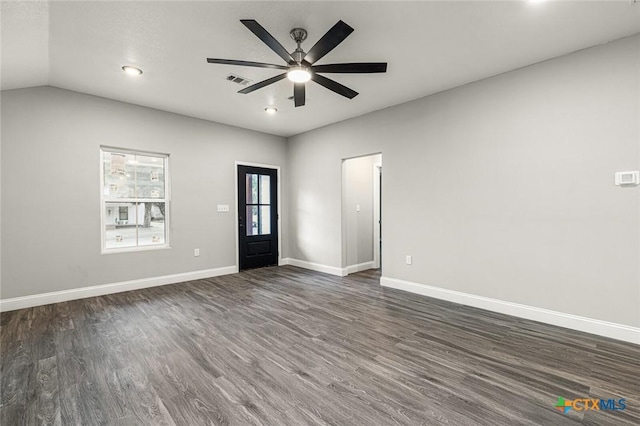 1935 Ross Ave, Waco, TX 76706 - unfurnished living room featuring a ceiling fan, dark wood-type flooring, baseboards, recessed lighting, and lofted ceiling