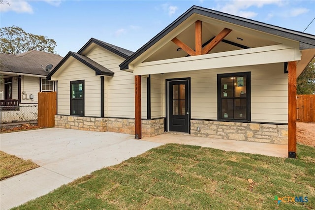 1935 Ross Ave, Waco, TX 76706 - view of front of property with stone siding and a porch
