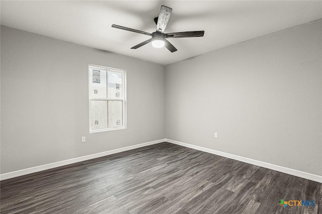 1935 Ross Ave, Waco, TX 76706 - spare room with dark wood-style floors, baseboards, and a ceiling fan