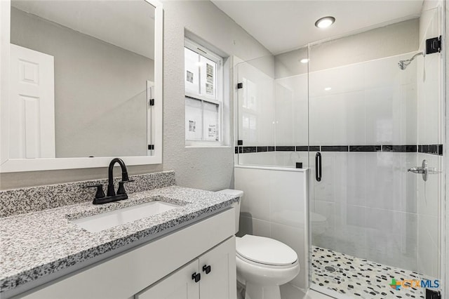 1935 Ross Ave, Waco, TX 76706 - full bathroom with a stall shower, toilet, and vanity