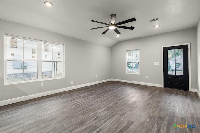 1935 Ross Ave, Waco, TX 76706 - unfurnished living room with dark wood finished floors, ceiling fan, baseboards, lofted ceiling, and recessed lighting