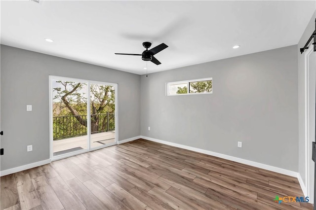 594 E S St, New Braunfels, TX 78130 - spare room with plenty of natural light, wood finished floors, ceiling fan, and recessed lighting