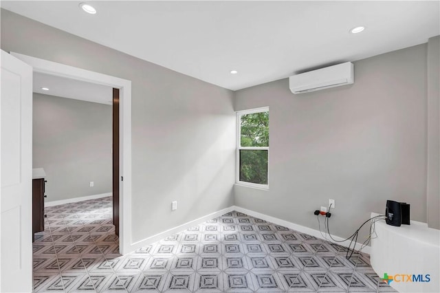 594 E S St, New Braunfels, TX 78130 - spare room featuring an AC wall unit, recessed lighting, and light flooring