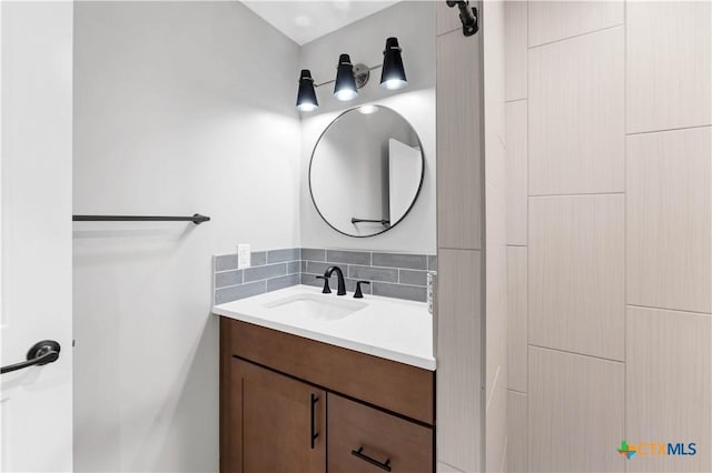 594 E S St, New Braunfels, TX 78130 - bathroom featuring vanity and backsplash