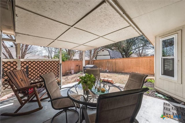 view of patio / terrace featuring a fenced backyard and outdoor dining area