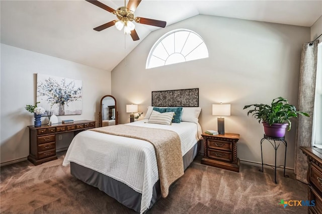 carpeted bedroom with lofted ceiling and a ceiling fan