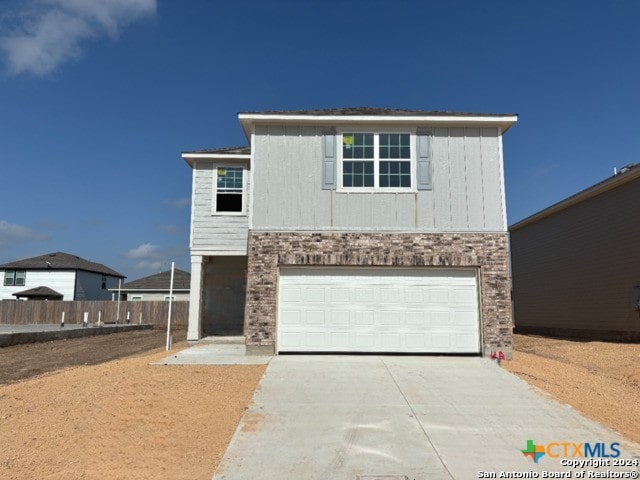 view of property with a garage