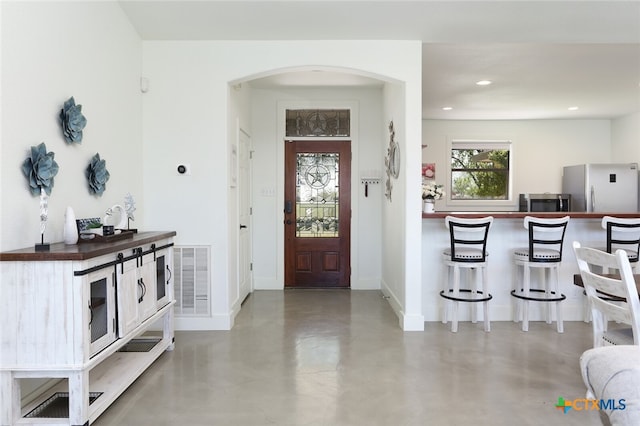 foyer with concrete floors