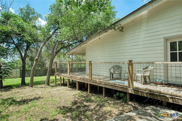 view of yard with a deck