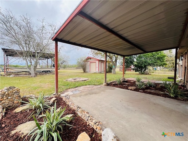 view of patio with a storage unit